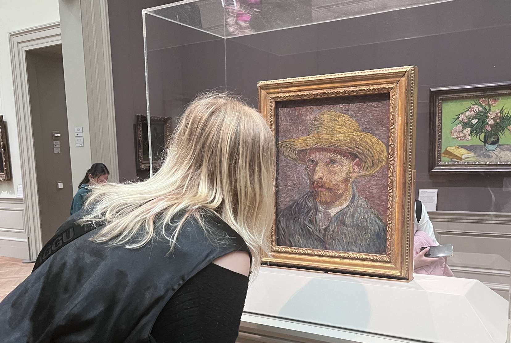 Izzy observing a Van Gogh painting.