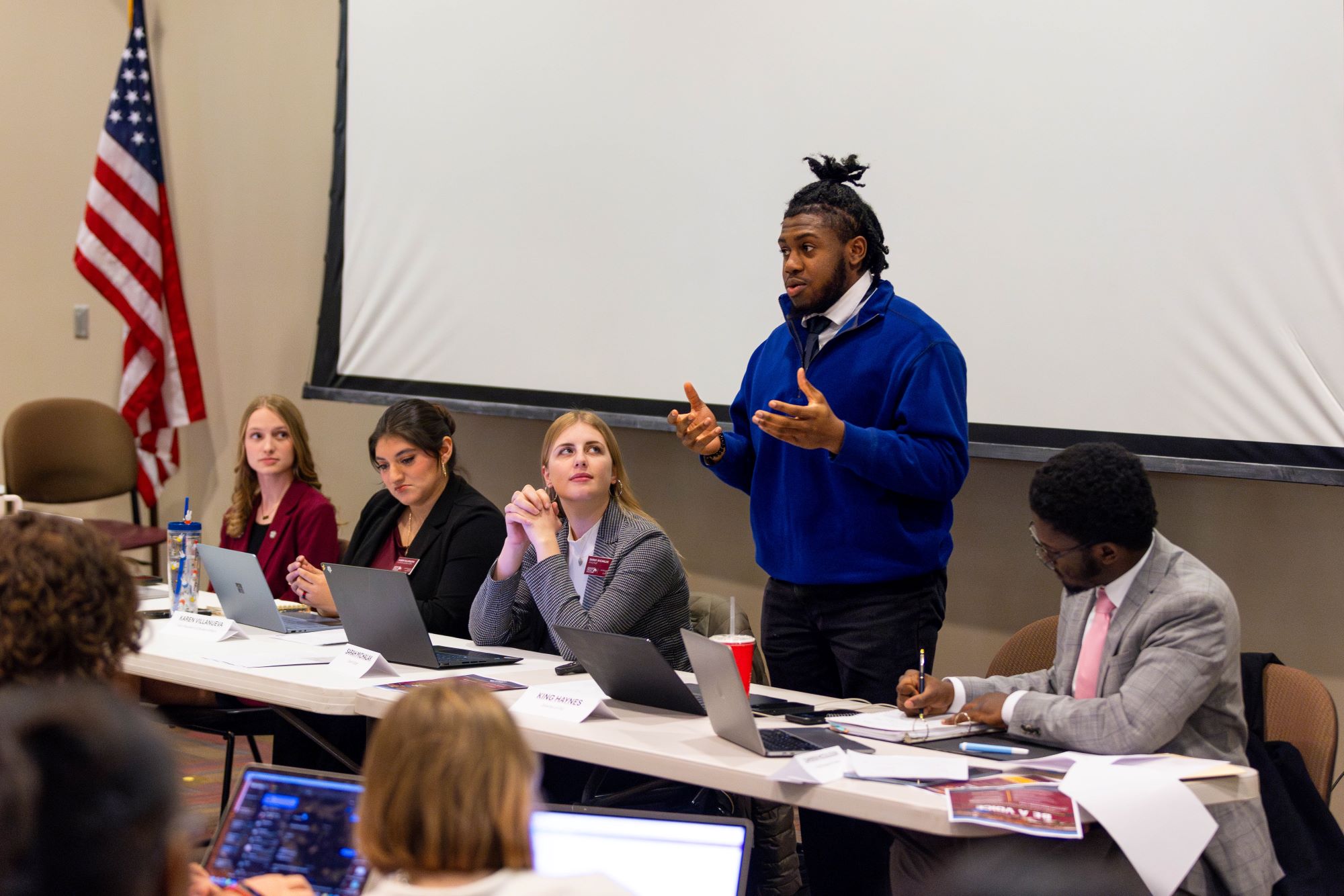 a student speaking at an RSO event
