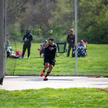 student doing hammer throw, track and field
