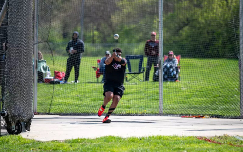 student doing hammer throw, track and field