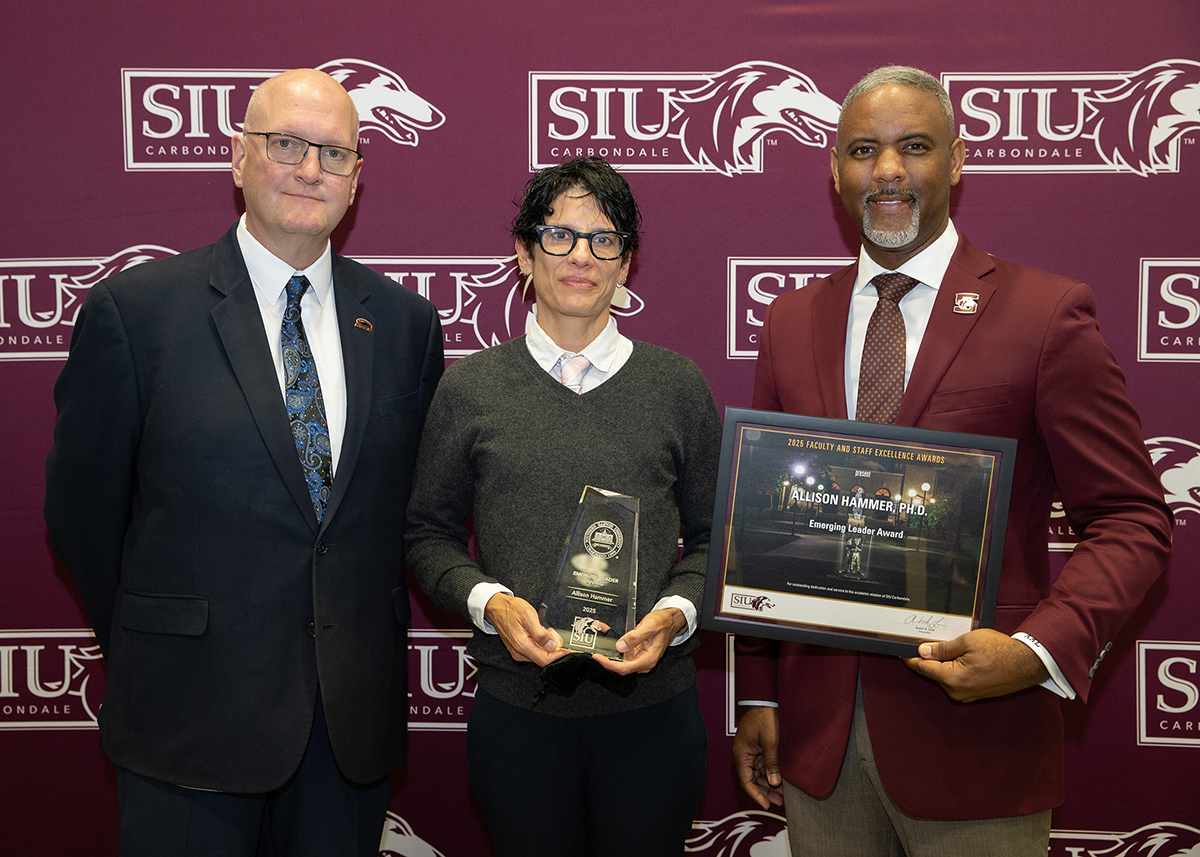 K. Allison Hammer, Joddy Murray, dean of the College of Liberal Arts and Chancellor Austin Lane. 