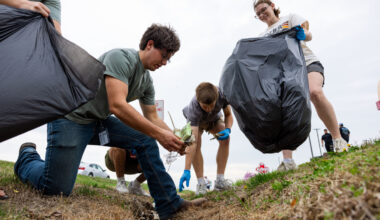 students planting trees for volunteer work