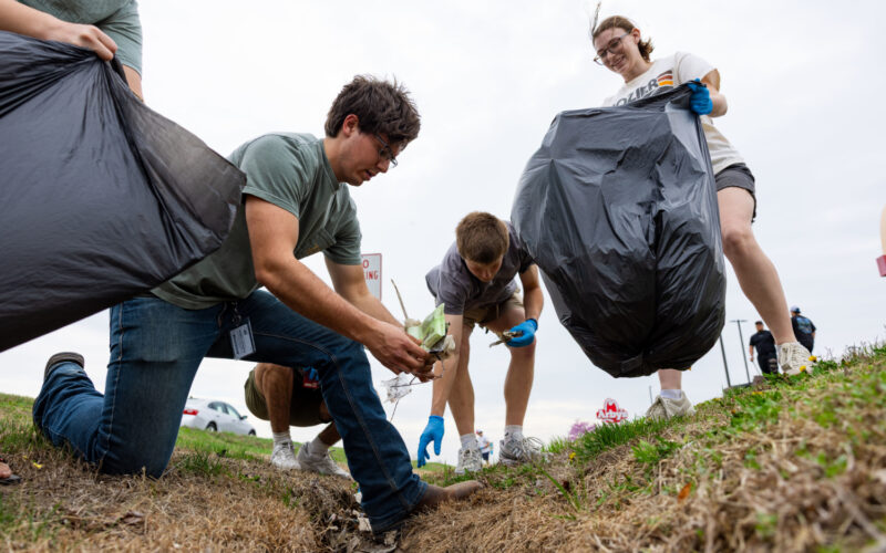 students planting trees for volunteer work