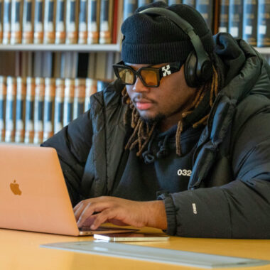 student working on a laptop