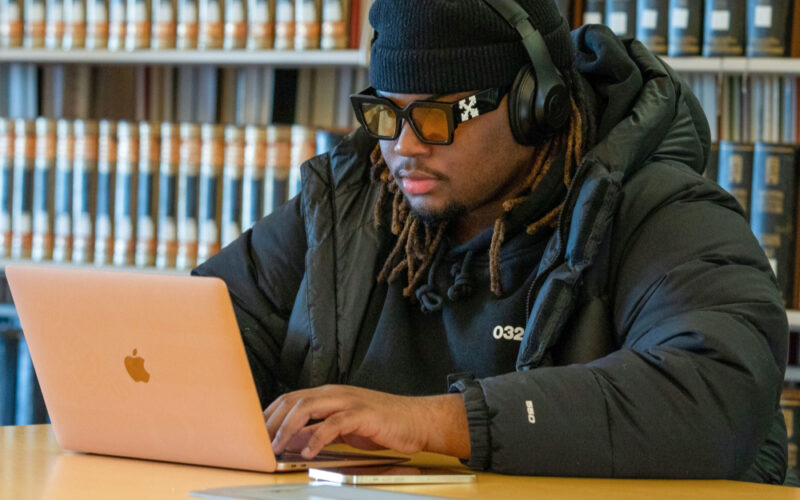 student working on a laptop