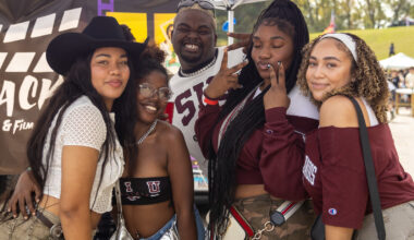 students having fun on campus wearing SIU gear