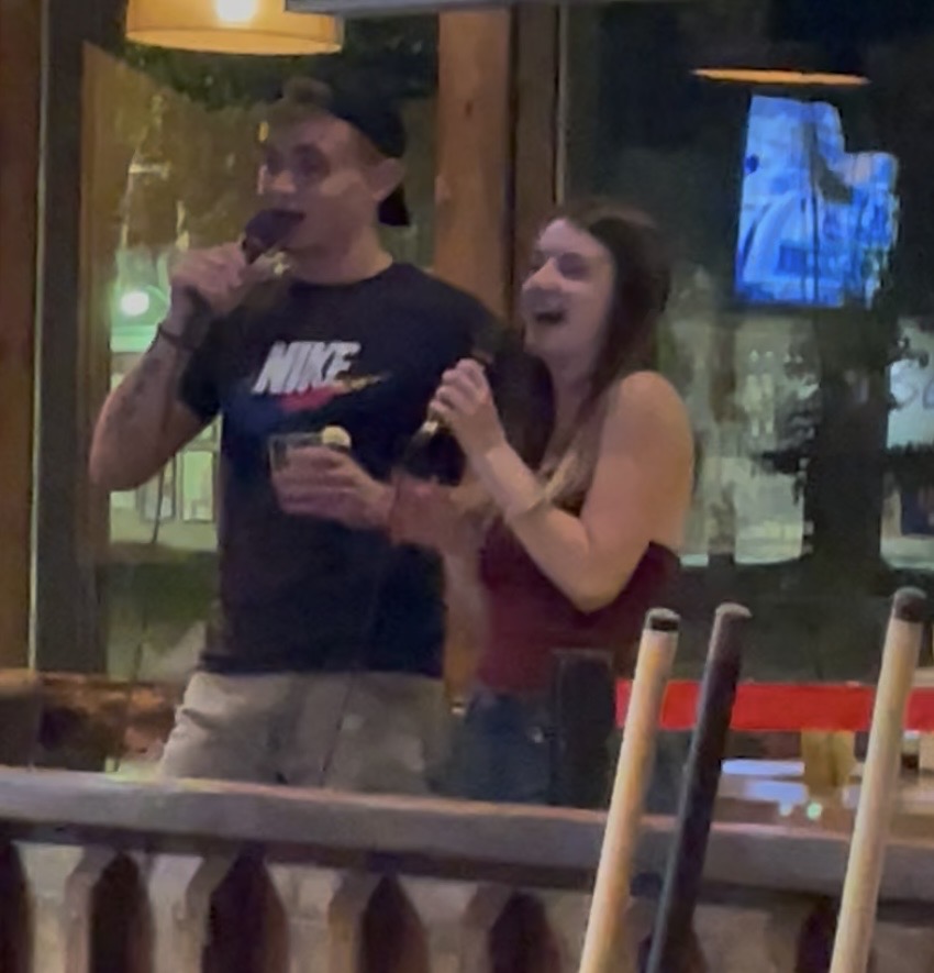 My boyfriend and I singing karaoke.