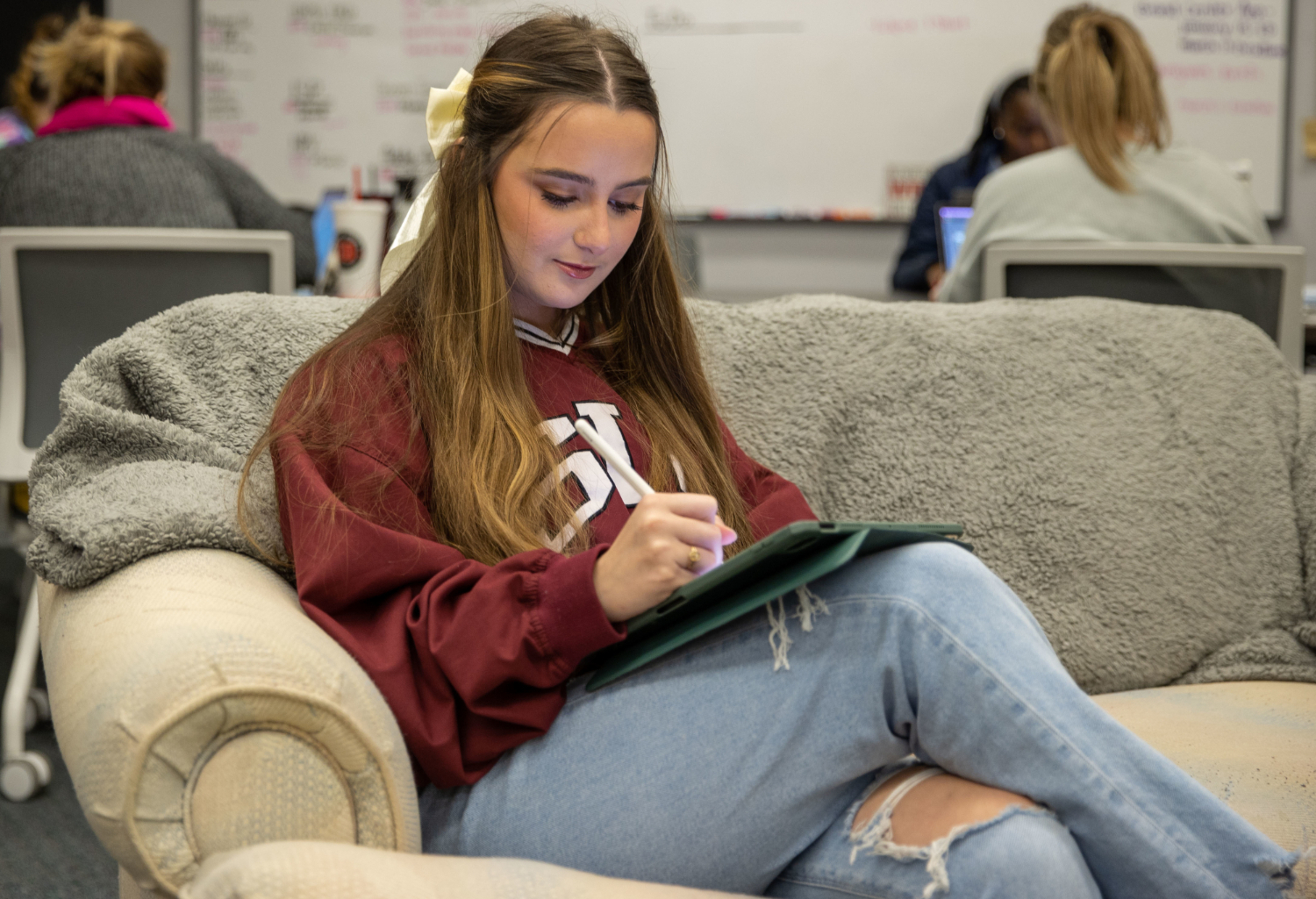 student working on an Ipad