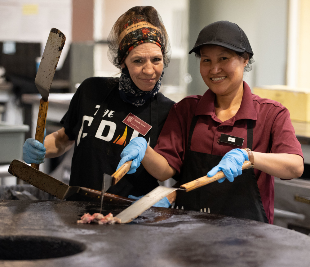 Workers making food at Trueblood Hall.