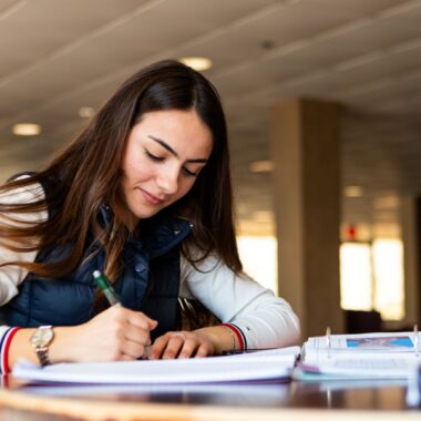 student studying in the library