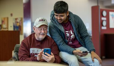 people looking at a phone