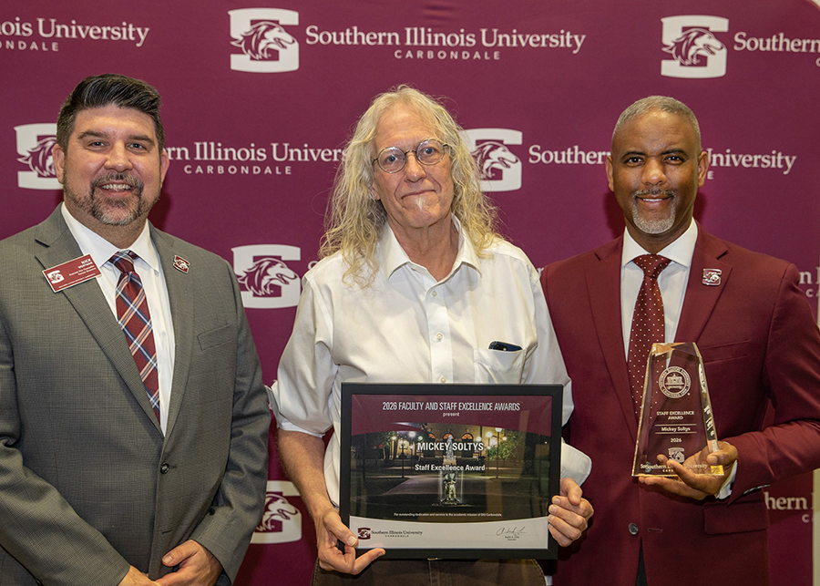 Nick Wortman, Mickey Soltys and Chancellor Austin Lane.