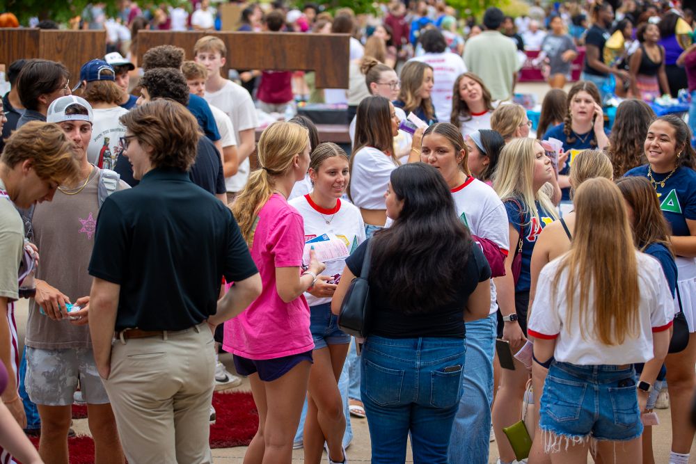 students talking to each other at the fall involvement fair 