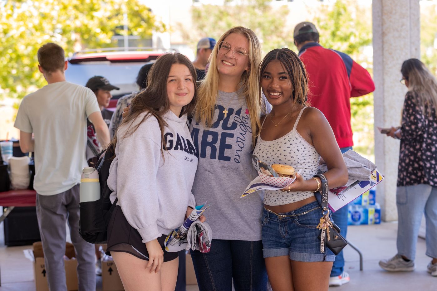 3 female students smiling